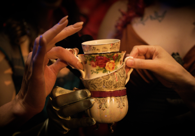 Guests sharing tea cups